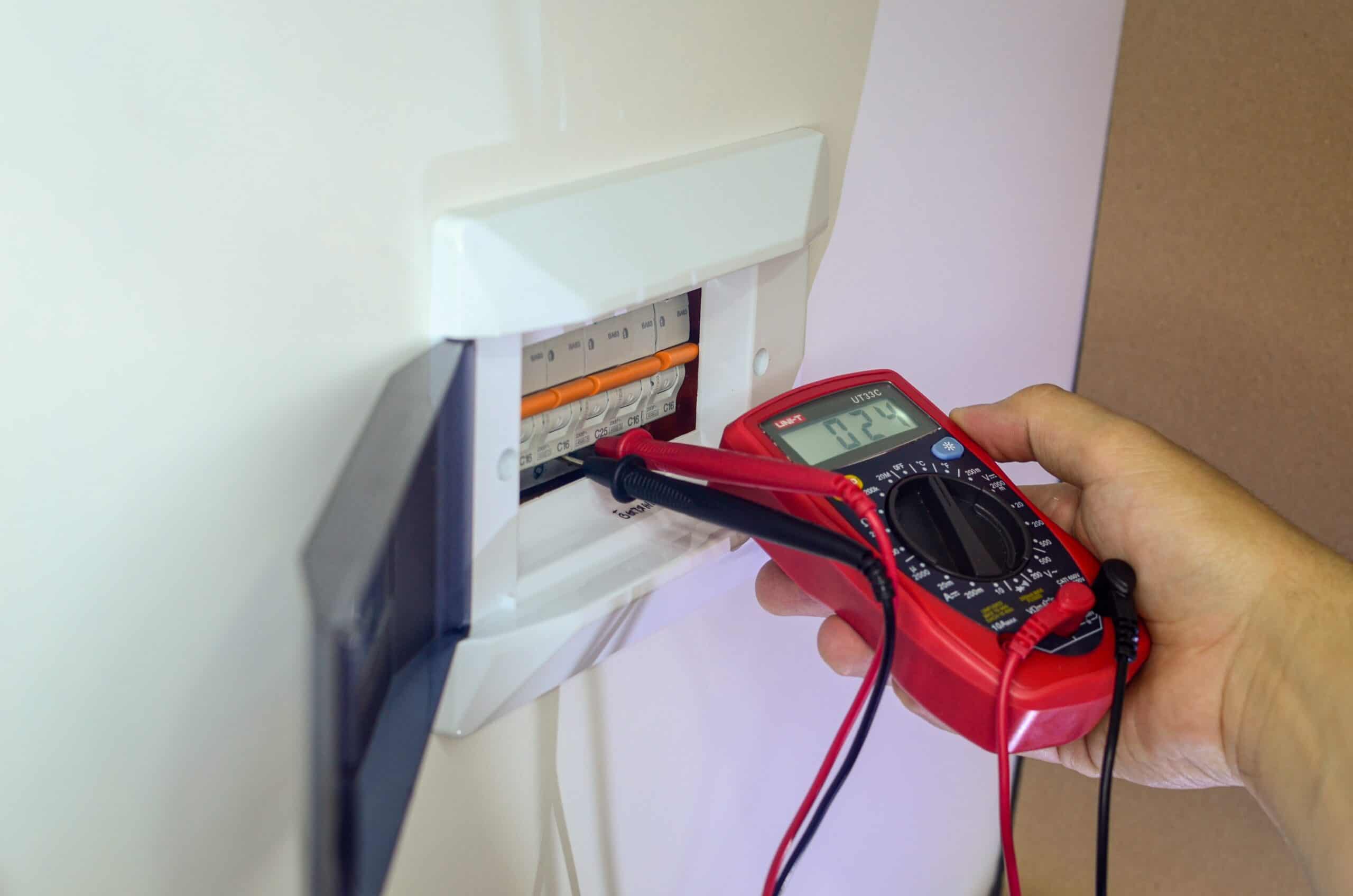 an electrician is repairing an electrical panel 2022 11 09 08 16 06 utc